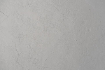 light gray texture of old wall with cracks, background