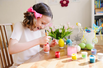 easter craft with kids - painting eggs at home. Seasonal spring decorations
