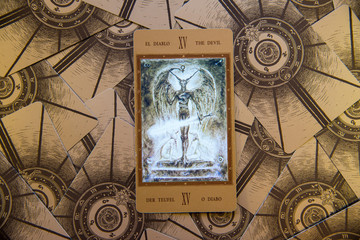 Tarot card The Devil. Labirinth tarot deck. Esoteric background.
