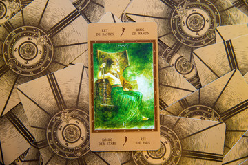 Tarot card King of Wands. Labirinth tarot deck. Esoteric background.