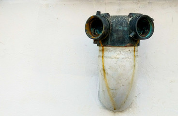 Old vintage fire department connection and rust stains in black and white tone, selective focus.