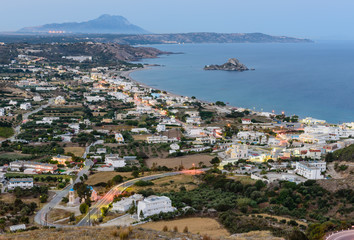 Fototapeta na wymiar Beautiful evening aerial view of the village Kefalos, Kastri island and the coast of Kos, Dodecanese, Greece
