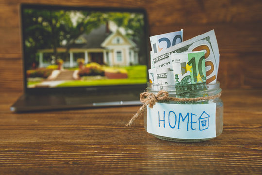 save money in jar for house, image of a house in laptop