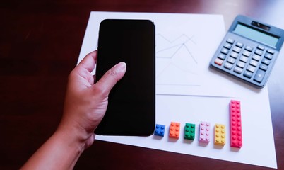 graph with calculator and mobile