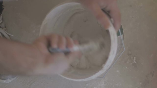 Stirring of mortar for stucco molding