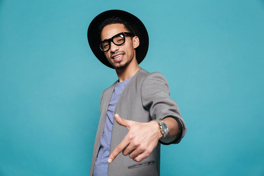 Portrait of an afro american man in eyeglasses and hat