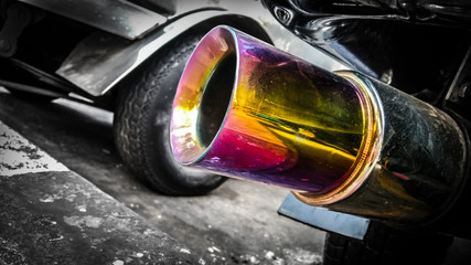 Multi color Rainbow exhaust pipe at the bottom of car .