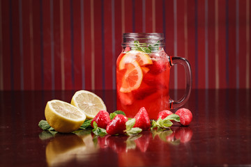 Coctail in a glass with raw fruit