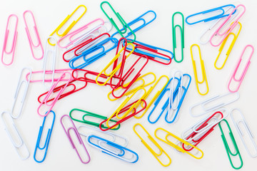 Metal paper clip isolated on a white background