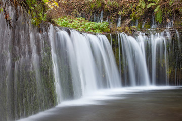 Shiraito Waterfall in autumn season ,  is located in the forests north of downtown Karuizawa , Japan