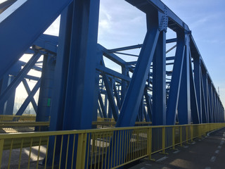 Yellow and blue river bridge in Zeebrugge , Belgium