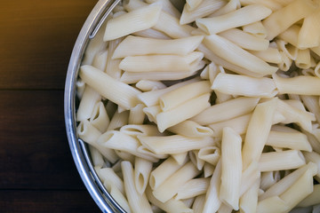 vermicelli in a pan on wooden background