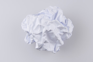 Crumpled paper on white. Paper is wrinkled