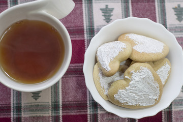 Cookies and cup of tea on the table