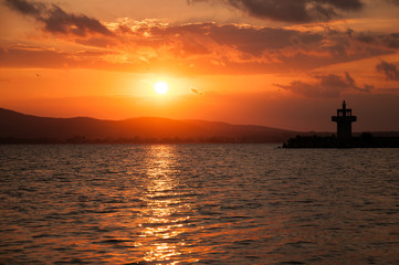 Fototapeta na wymiar A beautiful bright sunset on the Black Sea. Sozopol, Bulgaria.