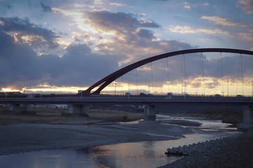 Sunset river and bridge