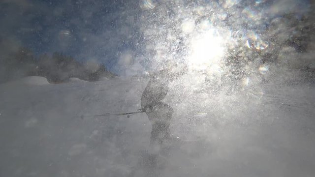 Kid skier skiing down the slope