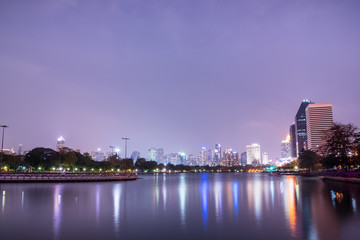 Bangkok city downtown at night with reflection of skyline, Bangkok,Thailand