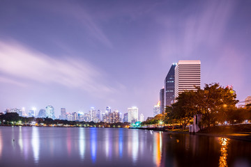 Bangkok city downtown at night with reflection of skyline, Bangkok,Thailand