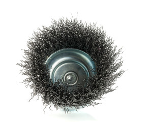 metal brush on a drill to remove rust isolated on white background