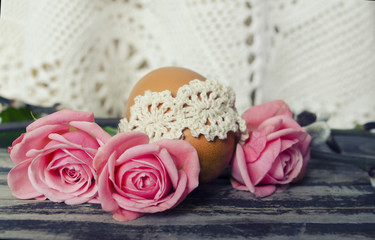 Beautiful blossoming tulip flower and Easter colorful eggs. Floral design. Nature background. Spring background with beautiful fresh flowers. Happy Easter. Still life with Pysanka. Easter background