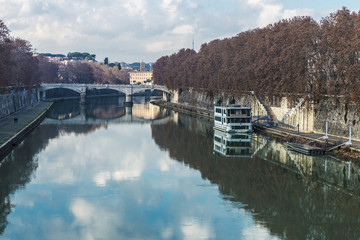 Fototapeta premium Bridge over the Tiber River in Rome, Italy