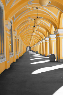 Long street gallery with arches, round lights, light and shadow