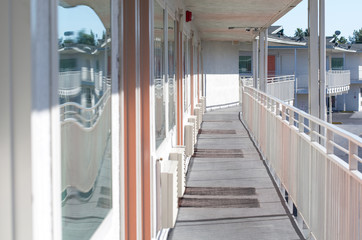 Perspective of the modern glass and steel balcony, deck, patio, promenade railing. Exterior