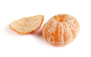 Ripe mandarin close-up on a white background. Tangerine orange. Colorful Food and drink still life concept. Fresh fruits and vegetables on color background. Clementine. Citrus. Fresh fruits. Diet.