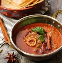 Rogan Josh / Kashmiri Lamb curry served in a Kadai, selective focus