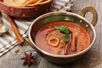 Rogan Josh / Kashmiri Lamb curry served in a Kadai, selective focus