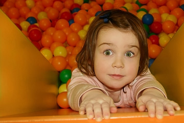 Cute little girl with green eyes. 