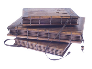 Vintage notebook with wooden covers on white background