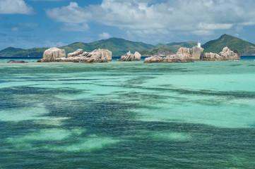 Big granite stones in turquoise water