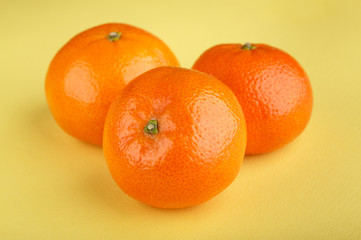 Ripe mandarin close-up on a white background. Tangerine orange. Colorful Food and drink still life concept. Fresh fruits and vegetables on color background. Clementine. Citrus. Fresh fruits. Diet.