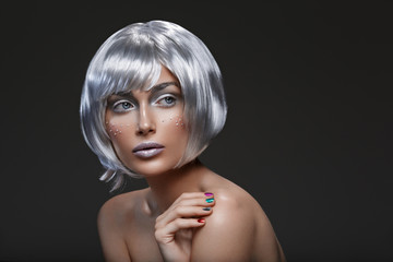 Beautiful girl in silver wig