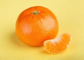 Ripe mandarin close-up on a white background. Tangerine orange. Colorful Food and drink still life concept. Fresh fruits and vegetables on color background. Clementine. Citrus. Fresh fruits. Diet.
