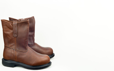 A pair of brown color leather safety boot with white background