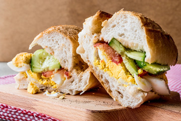 Egg Sandwich with cucumbers and tomatoes.