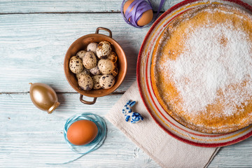 German Easter cake on a platter and quail eggs