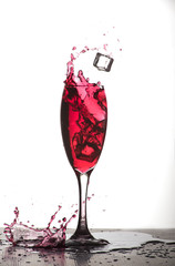 Red wine in a glass isolated on white background - realistic photo image