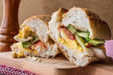 Egg Sandwich with cucumbers and tomatoes.