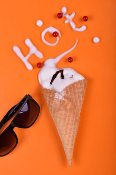 colorful ice cream on orange background. hot summer decert