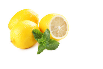 Fresh mint leafs and lemons isolated on a white