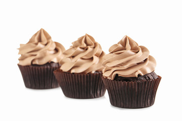 Tasty cupcakes isolated on a white