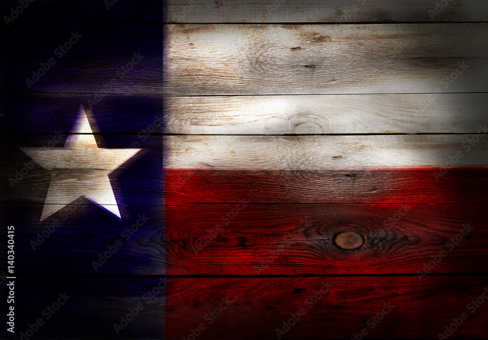 Wall mural Flag of Texas USA painted on grungy wood plank