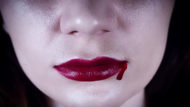 4K Horror Close-Up of Woman Lips Bleeding
