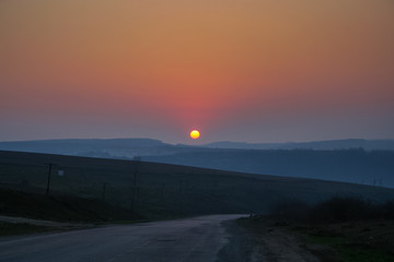 Sunset near the village of Babin Average of Kalush district of Ivano-Frankivsk region of Ukraine. March 2007