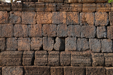 old historical laterite wall, background of stone texture