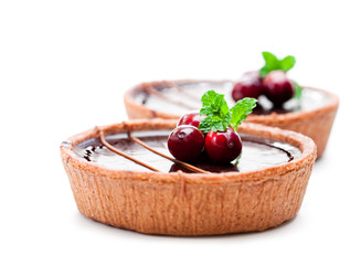 mini  chocolate tarts isolated on white background